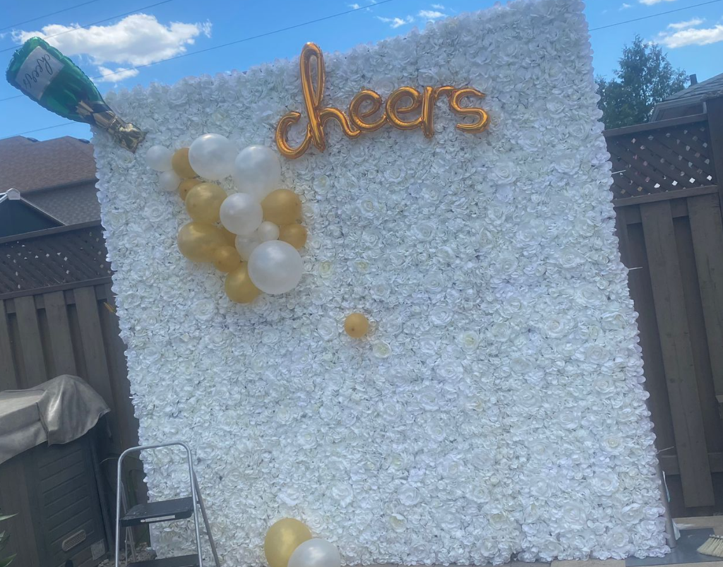 Toronto white flower wall outside with balloons