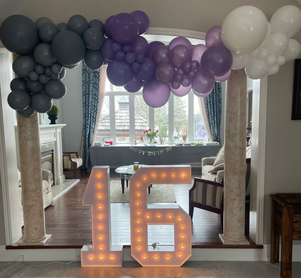 Toronto Balloon Garland in doorway above marquee letter 16 