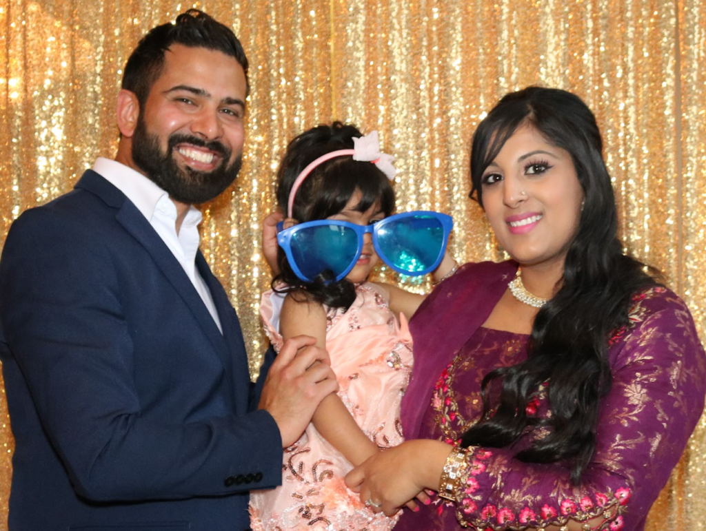 Toronto photo booths photo with 2 parents and a child