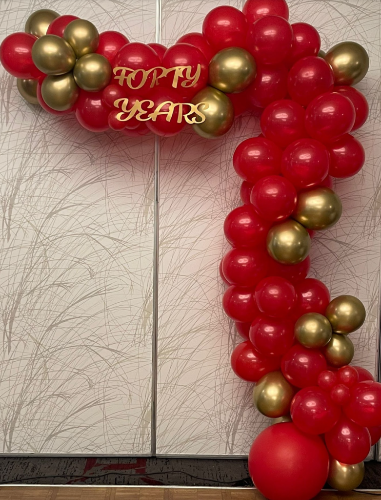 Brampton Balloon decor half arch with red and gold